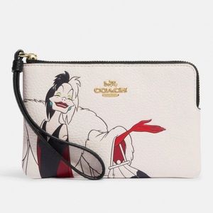 NWT Disney X Coach Corner Zip Wristlet With Cruella Motif